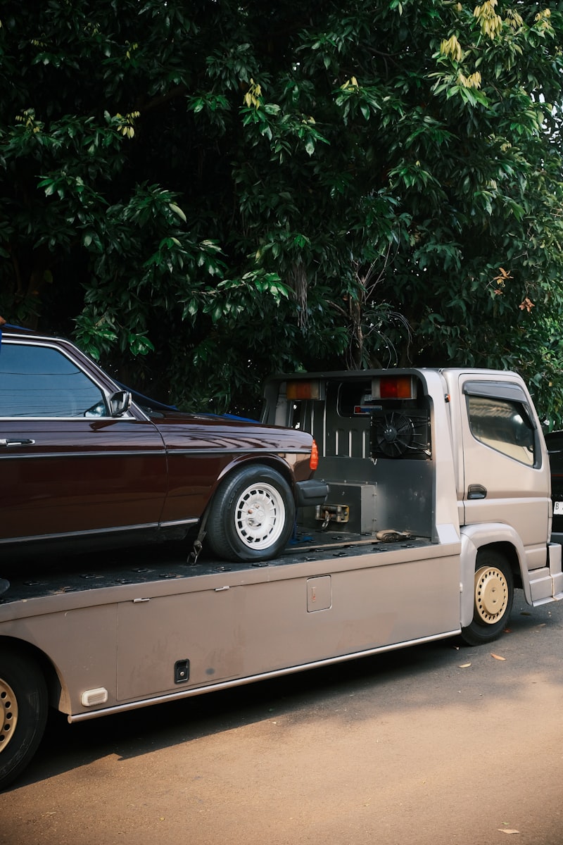 Car loaded on a vehicle transport flatbed