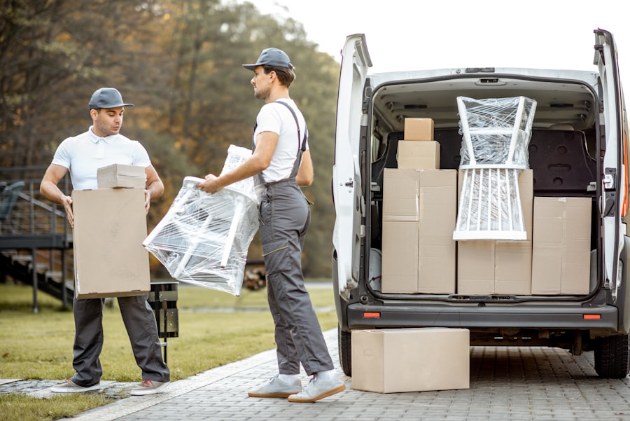 Professional movers loading boxes into a van